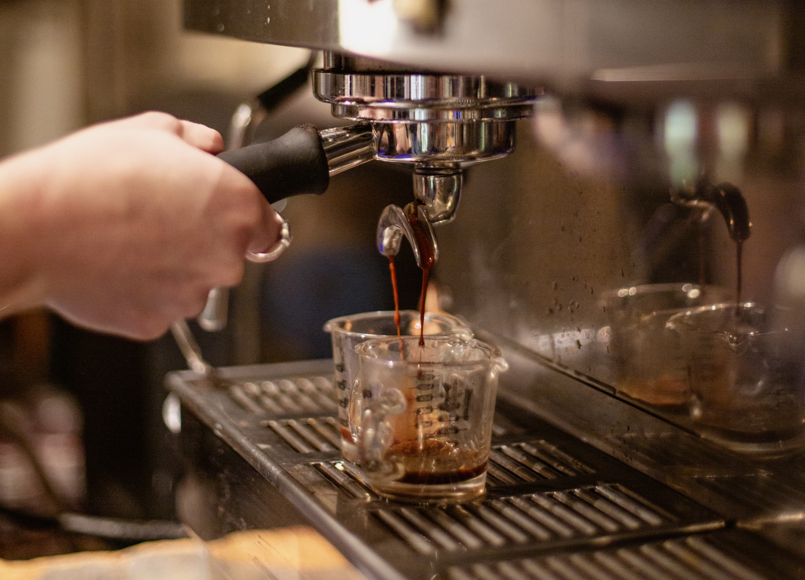 A barista making a drink at The Edgewater