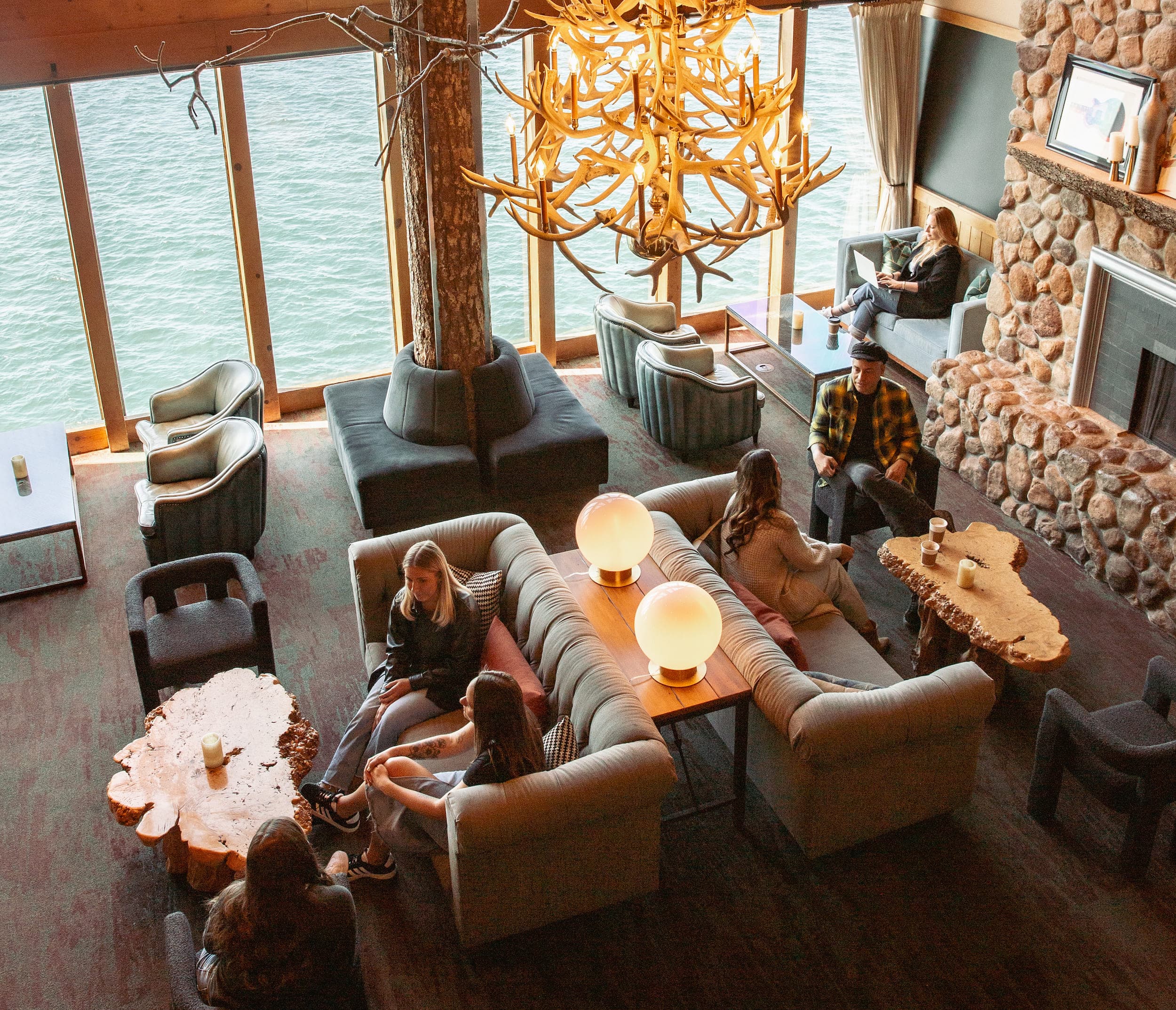 Different groups of people hanging out in Edgewater's lobby