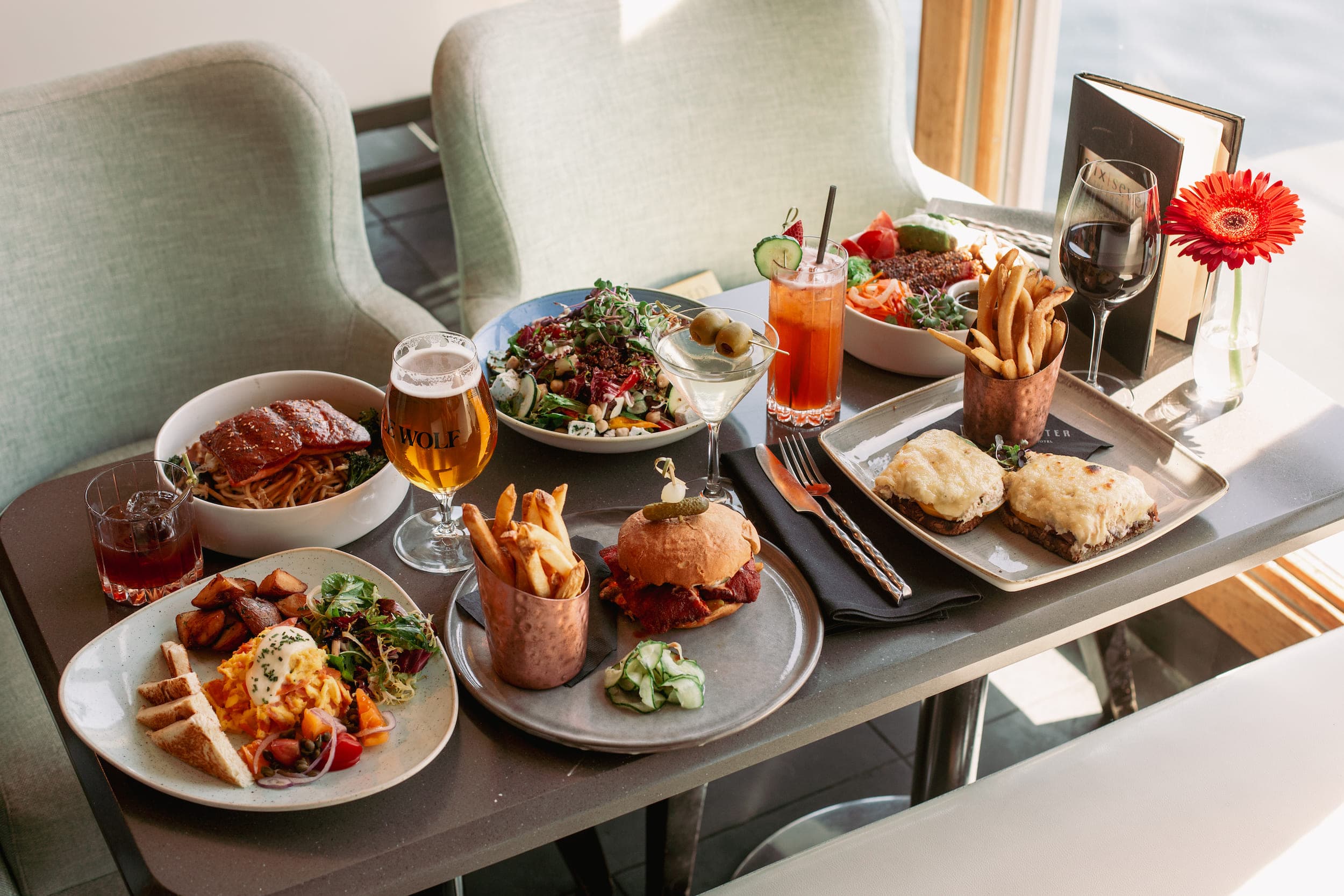 A spread of 6 dishes at Six Seven Restaurant at The Edgewater