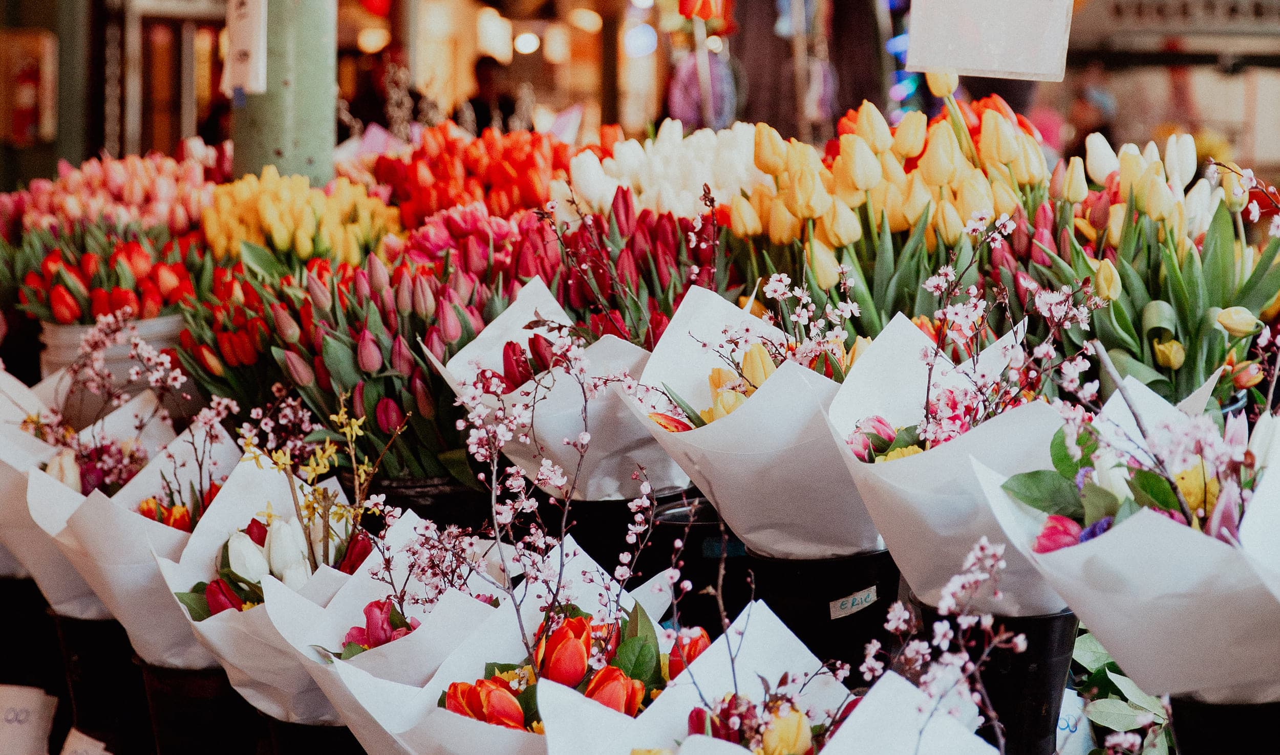 A bunch of bouquets of flowers in the Pike Place Market