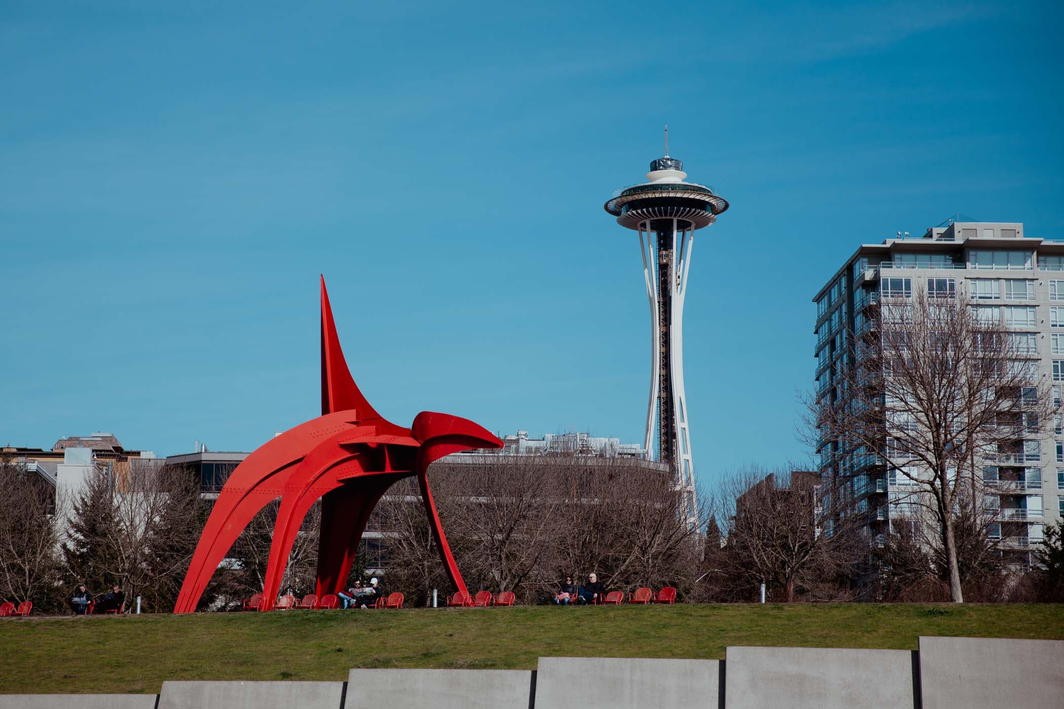 A view of the Space Needle in Seattle from a park