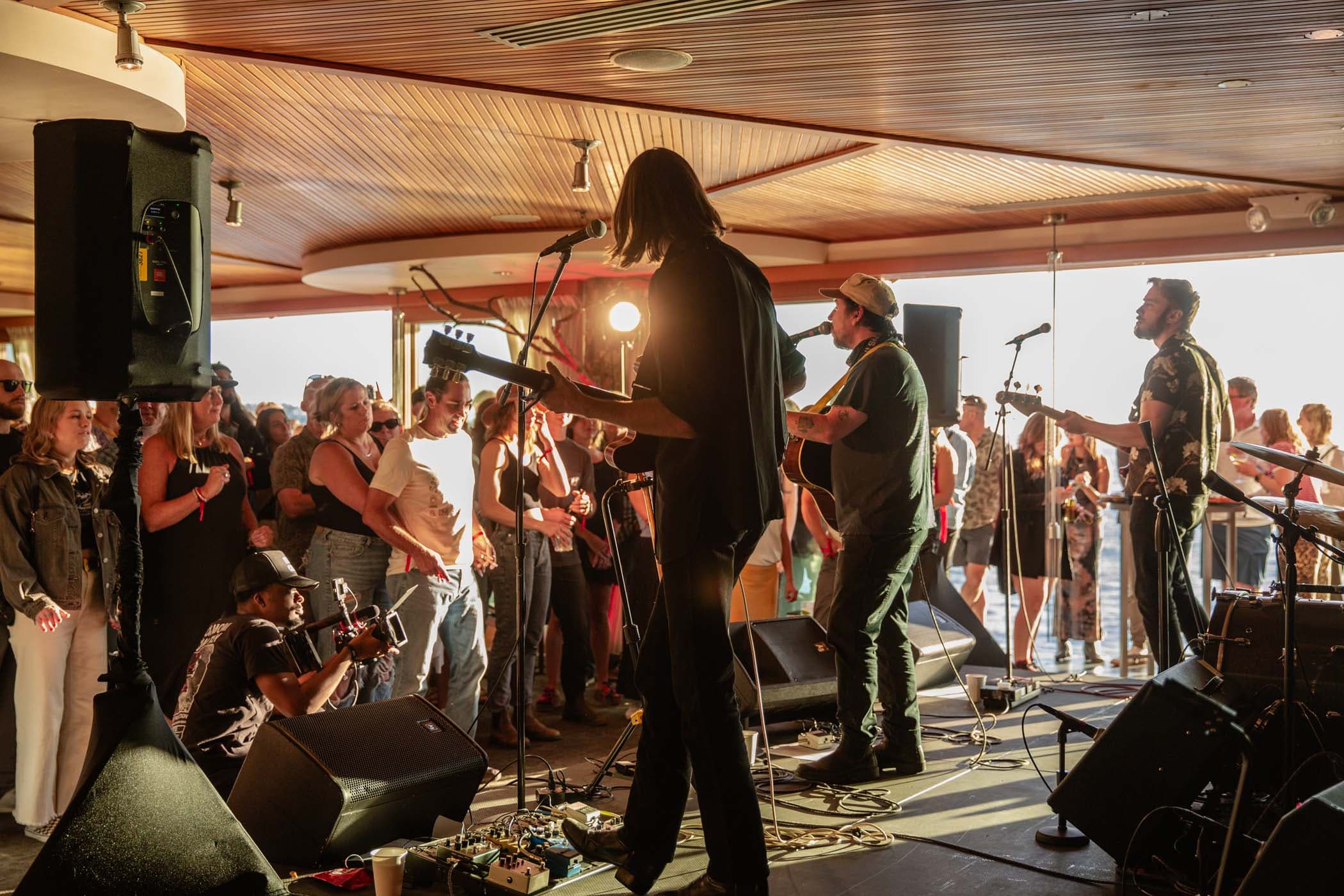 A band playing at Susto Edge in Seattle with a good crowd supporting them