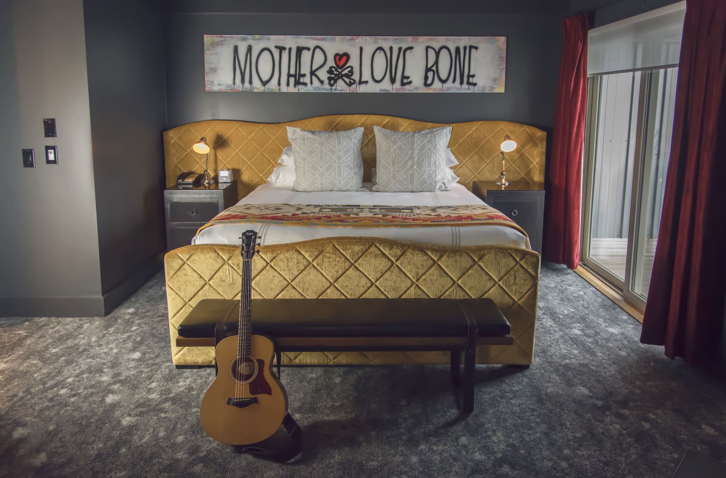 A pearl Jam inspired room with an acoustic guitar at Edgewater