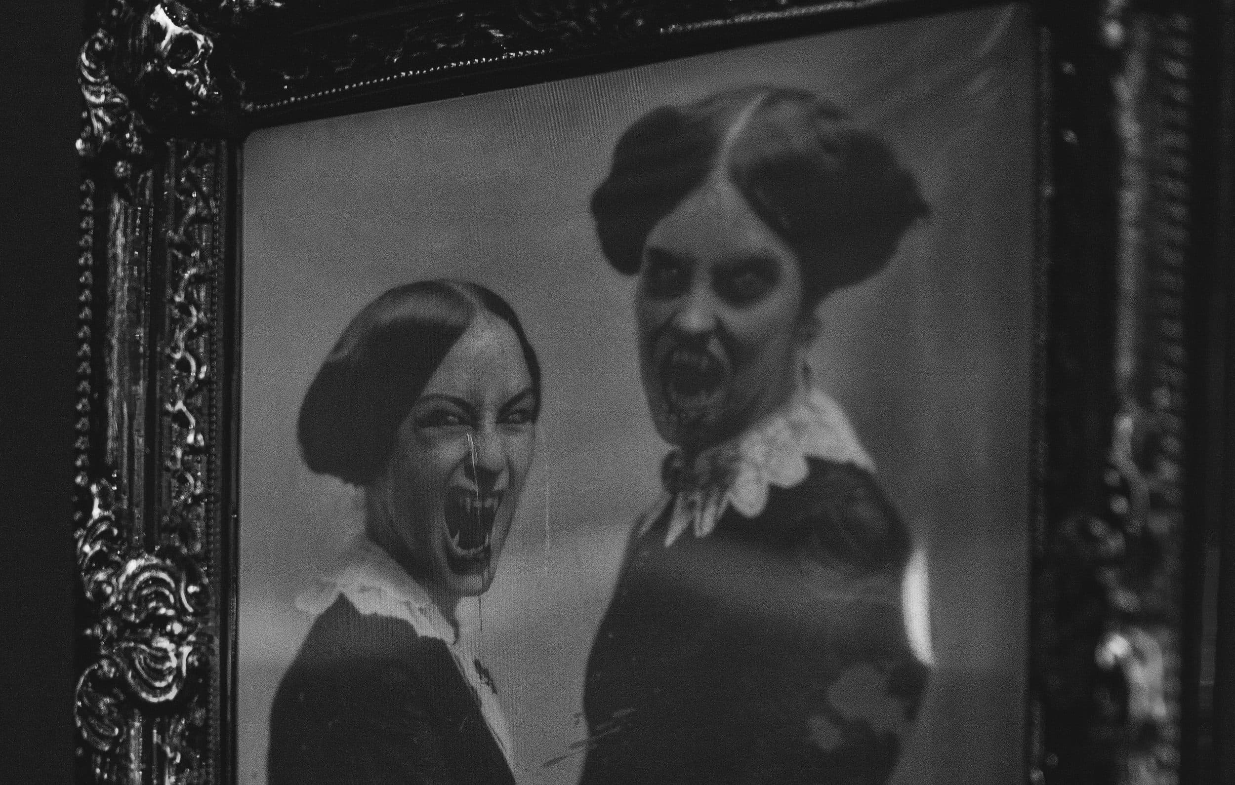Vintage vampire portrait in ornate frame decorating The Edgewater Hotel Seattle for Halloween