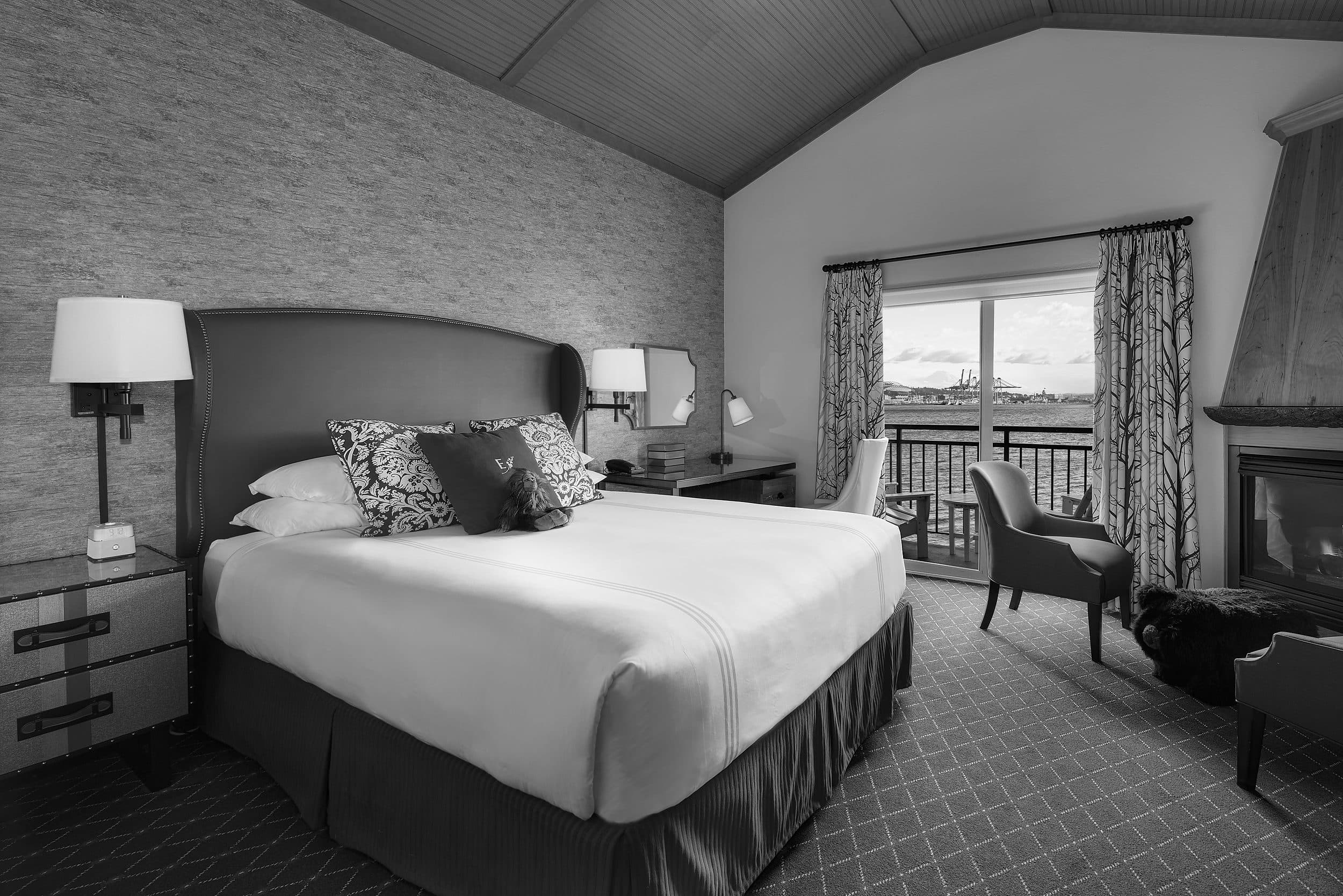 King guest room with private waterfront balcony and Elliott Bay views at The Edgewater Hotel Seattle