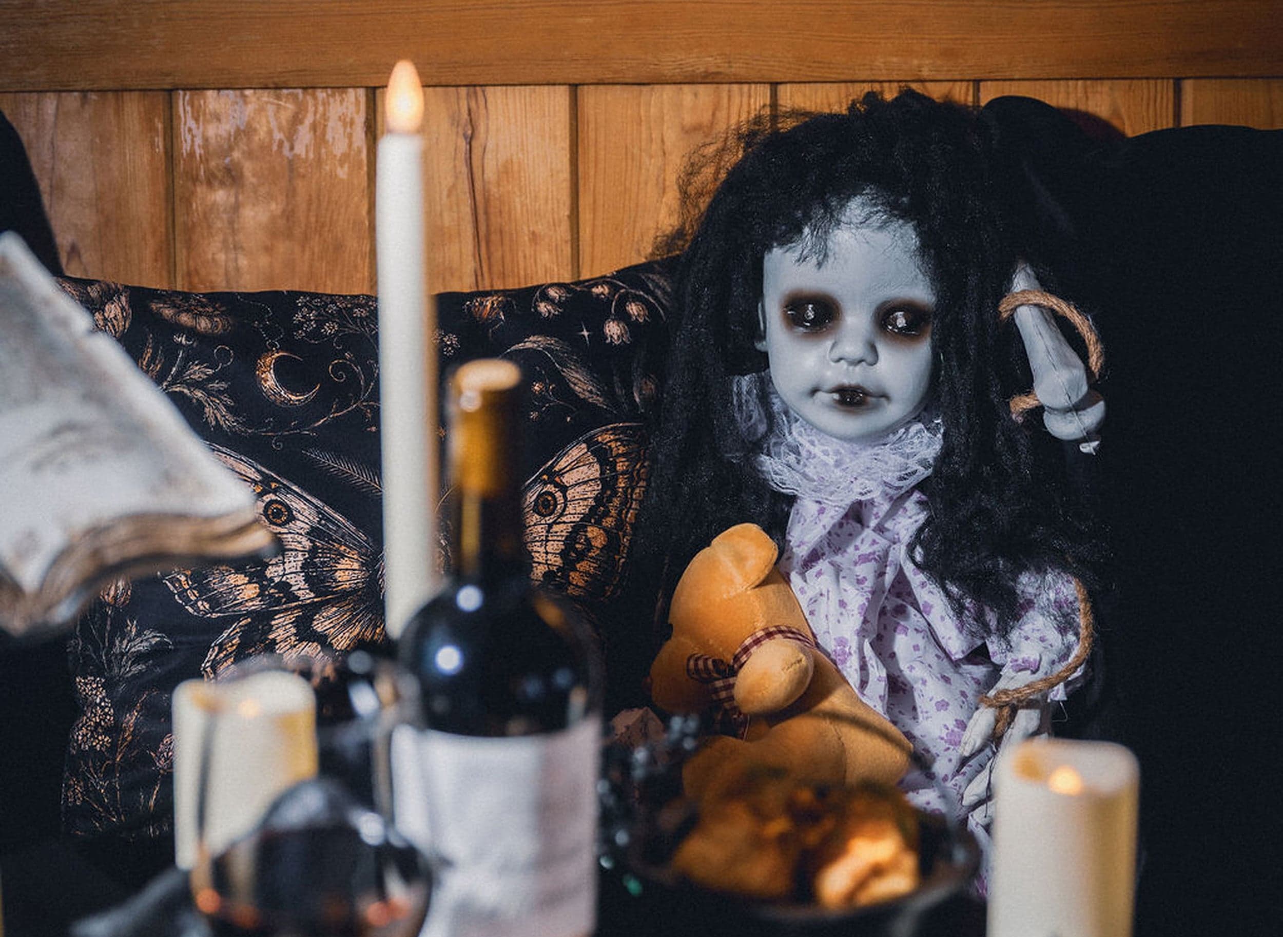 Spooky vintage doll décor at the Haunted Lobby Bar pop-up at The Edgewater Hotel, a Seattle waterfront Halloween experience