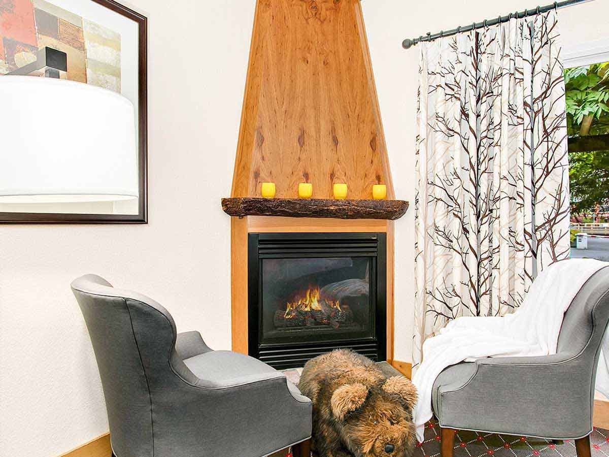 Guest room sitting area with city view.
