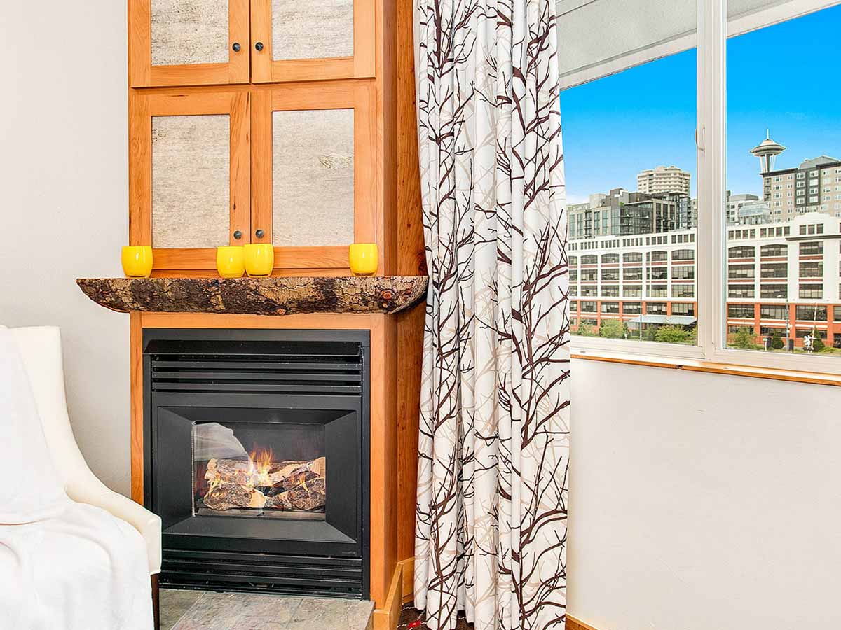 Guest room sitting area with city view.