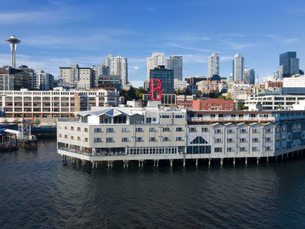 Exterior of the Edgewater Hotel against Seattle's skyscrapers