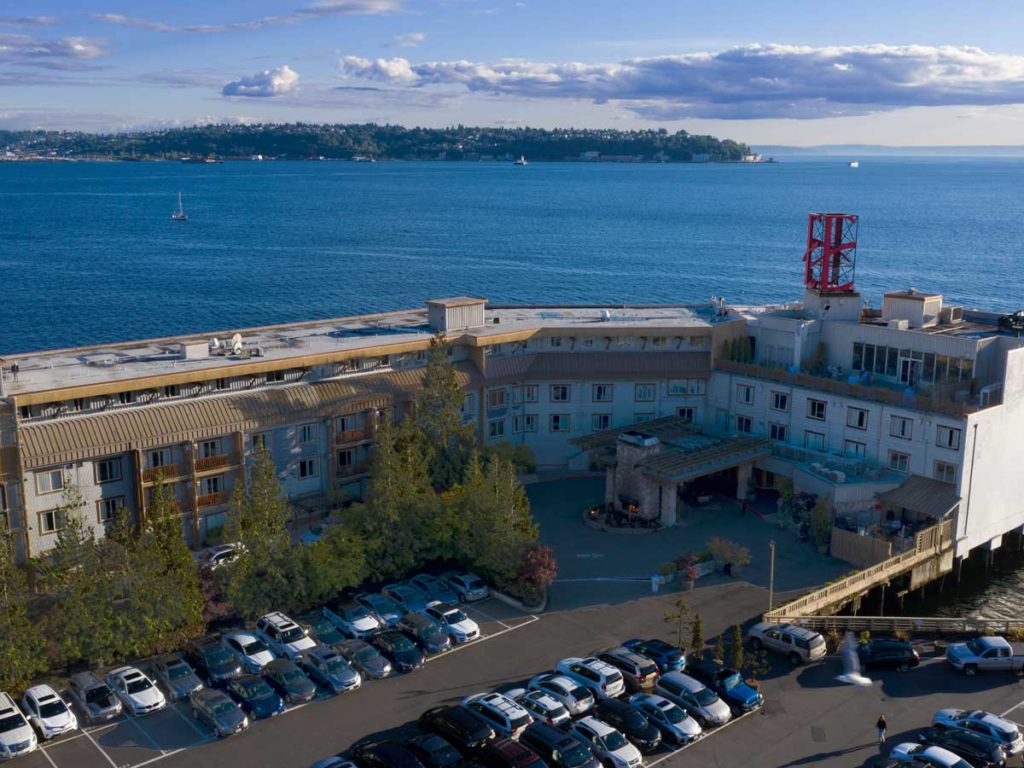 Aerial view of the Edgewater Hotel with Puget Sound in the back