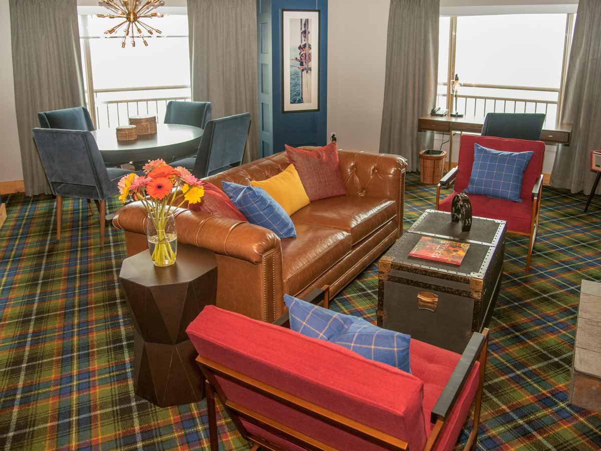 Beatles suite room with sofa, dining table.