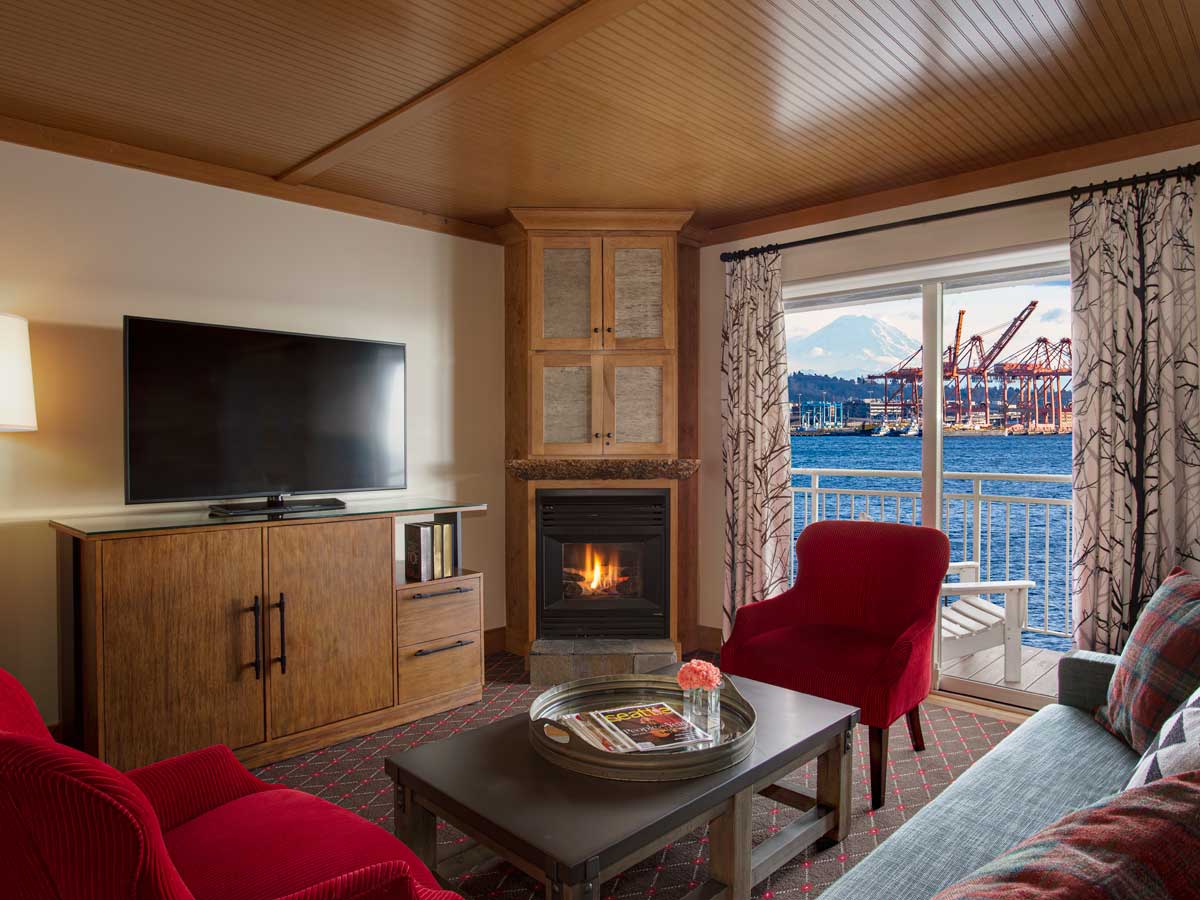 Guest room sitting area with water view.