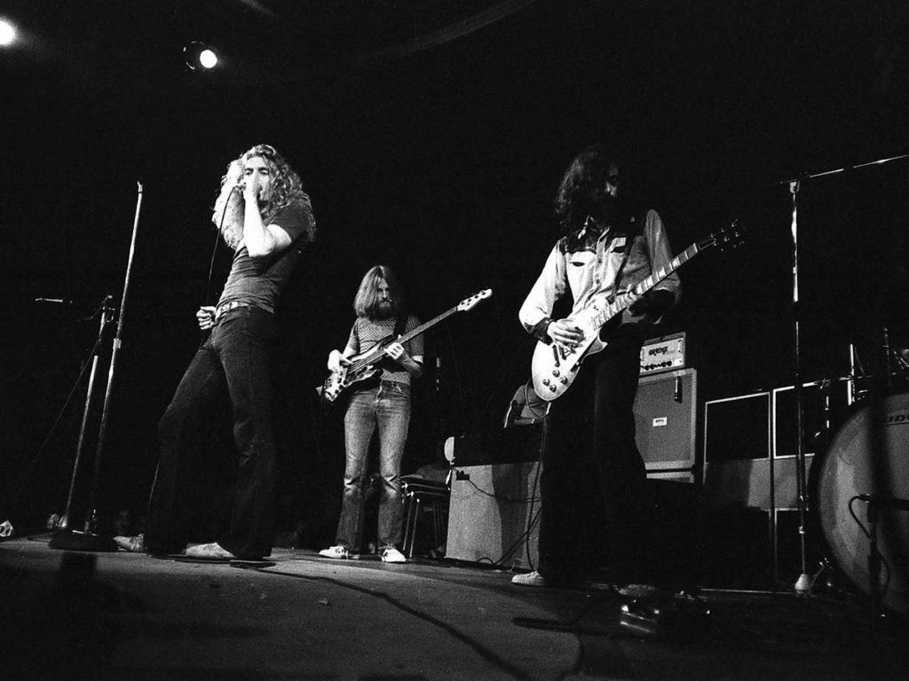 Led Zeppelin on stage.