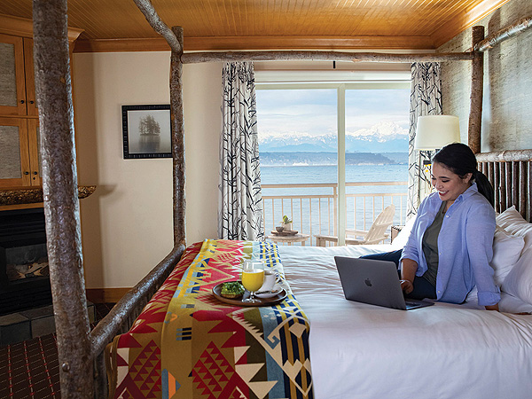 Person With A Computer In An Edgewater Guestroom.