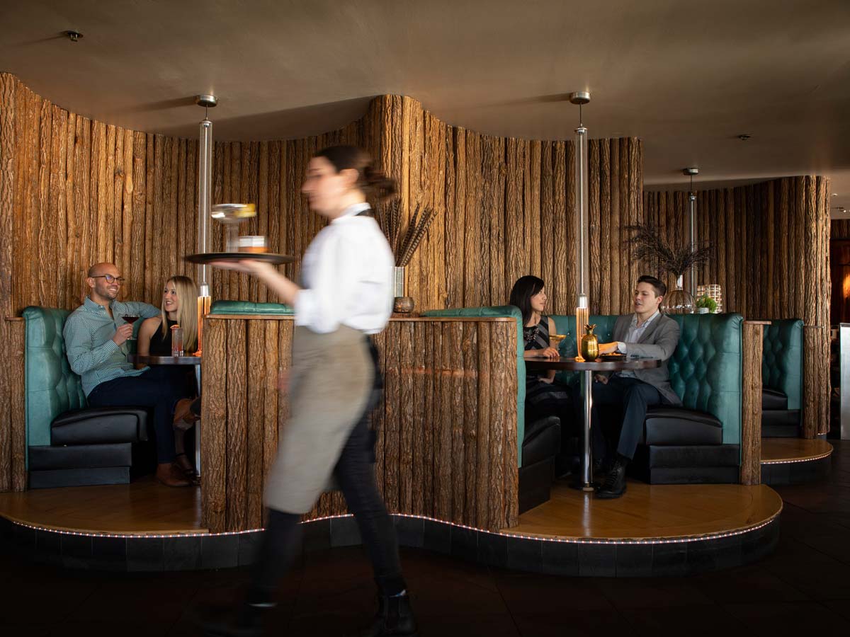 Waitress Brining Food At Six Seven In Seattle.