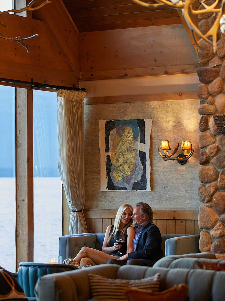 Couple Sitting In The Edgewater Hotel Lobby.