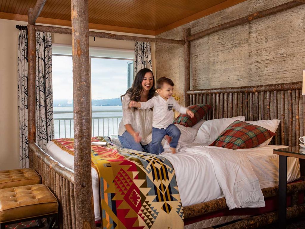 Mom And Son On The Bed At The Edgewater.