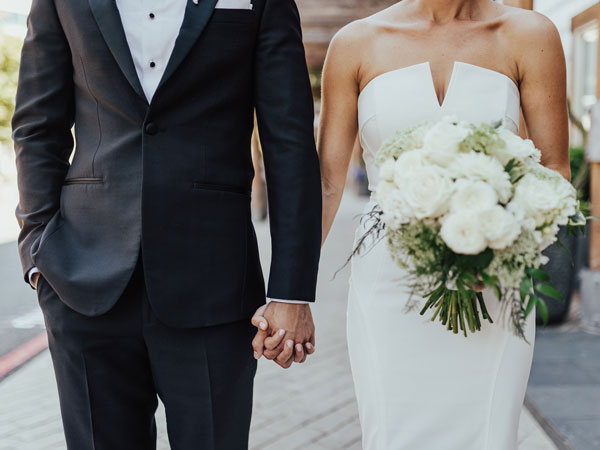 Bride And Groom Holding Hands